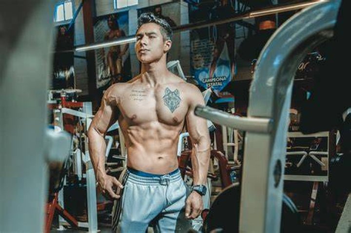 Chest, Barechested, Trunk, Abdomen, Muscle, Electric blue, Video camera, Cobalt blue, Stomach, Camera, 