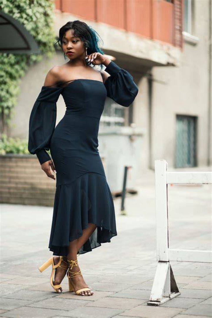 Dress, Clothing, Shoulder, Fashion model, Strapless dress, Cocktail dress, Red carpet, Hairstyle, Carpet, Cobalt blue, 