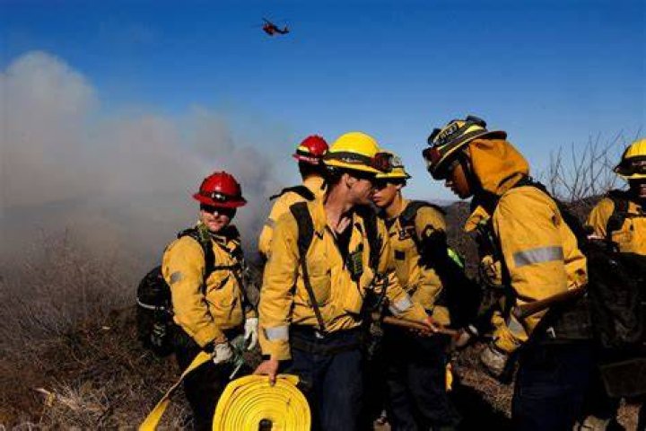 Firefighters race to battle a spot fire at the Rocky Fire in Lake County, California July 30, 2015. Photo by Max Whittaker/Reuters