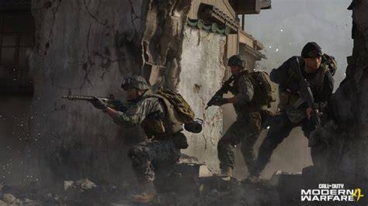 Image of two Modern Warfare characters standing together near tyres