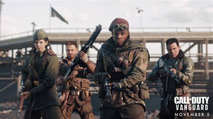 Image showing Vanguard operator holding gun