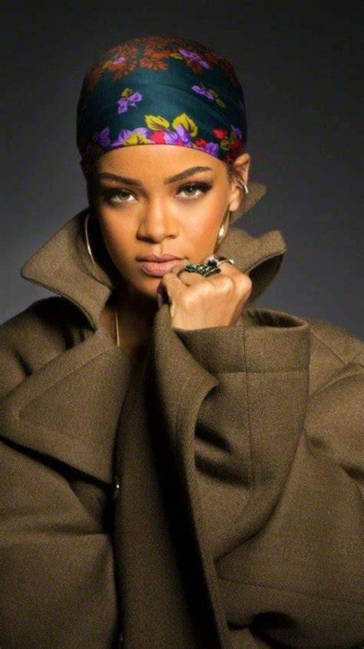 Rihanna wears a colorful scarf over her head as she leaves her hotel Rihanna wears a colorful scarf over her head as she leaves her hotel